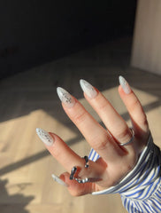 Metallic Patterned White Nails