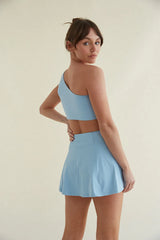 Avery Smoothing Flare Tennis Skort in Blue